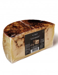 Sheep cheese with black...